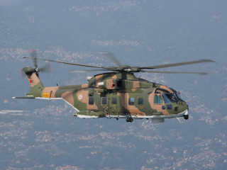 Military helicopter flying city sky - a propeller free wallpaper
