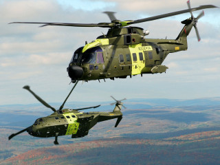 Military helicopters flying mountain range - the sky above a mountain range free wallpaper