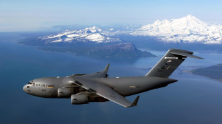 Military plane flying water mountains - a large military plane free wallpaper