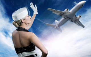 Woman black dress white hat 2 - a plane in the background free wallpaper