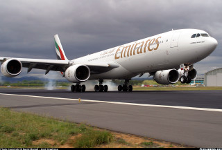 Large jetliner takeoff smoke digital - gear free wallpaper