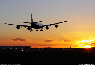 Plane sunset sky clouds dawn - the sun setting behind free wallpaper
