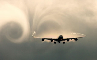 Plane flying cloud formation jetliner - free airplane wallpaper