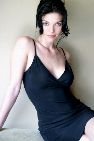 Woman black dress posing bed - daphne allen free wallpaper