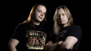 Two men black background black - a black background behind them free wallpaper