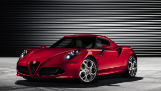 Red sports car garage black 2 - a black wall behind free wallpaper