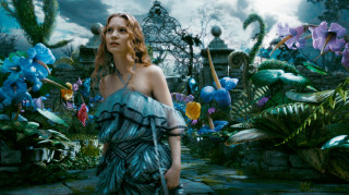Woman blue dress garden flowers - anamorphic free wallpaper