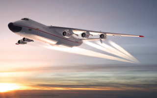 Jet flying sky sun clouds - a jet free wallpaper