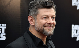 Smiling man beard black shirt - black shirt free wallpaper