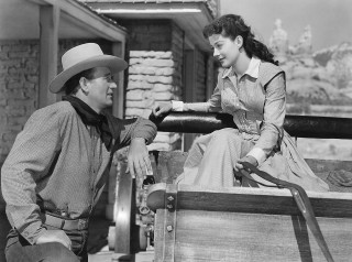 Western romance cowboy gun bench - claude rogers free wallpaper