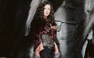 Medieval woman cave sword helmet - her hand and a helmet free wallpaper