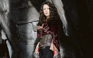 Medieval woman cave sword helmet 2 - her hand and a helmet free wallpaper