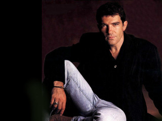 Man sitting floor legs crossed 2 - ignacio fernandez rio free wallpaper