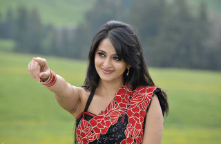 Woman red black dress pointing - her finger free wallpaper