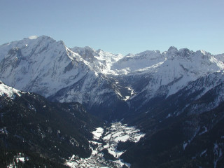 Mountain snow river range view - a view of a mountain range free wallpaper
