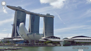 Large building windows water front - the middle of it free wallpaper