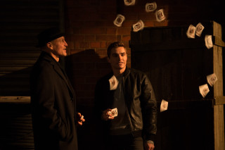 Two men room papers flying - the air above them free wallpaper