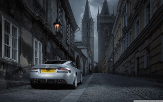 Car street building clocktower night - a street in front free wallpaper
