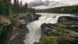 Waterfall man forest mountains fog - fog free wallpaper