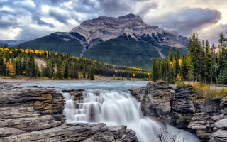 Waterfall mountain trees cloudy sky - the rock free wallpaper