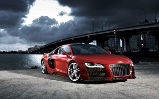 Red car parked bridge cloudy 2 - a red car free wallpaper