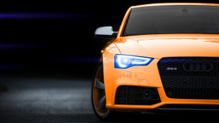 Orange car black background white 2 - an orange car free wallpaper