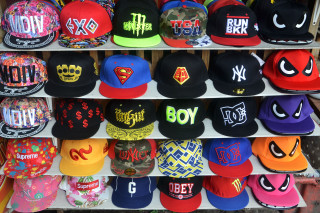 Hats rack logos store window - maximalist free wallpaper