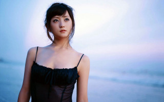 Woman beach blackdress portrait photorealistic - a beach next free wallpaper