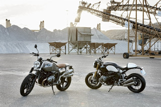 Motorcycles parked parking lot construction - a crane in the background free wallpaper