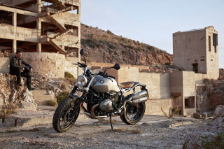 Motorcycle parked building man sitting - a staircase free wallpaper