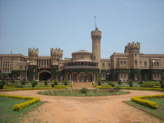 Large building tower clock garden - front view free wallpaper