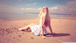 Woman beach hair blowing wind 2 - the wind free wallpaper