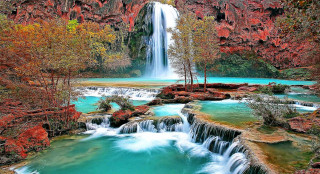 Waterfall blue pool trees foreground - free nature wallpaper