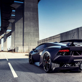 Black sports car parked bridge 2 - a road free wallpaper