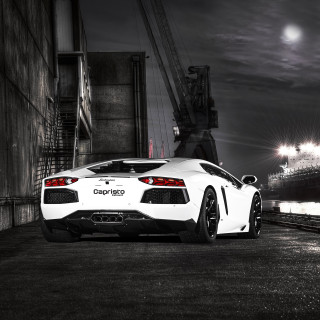 White sports car parking lot 26 - night time free wallpaper
