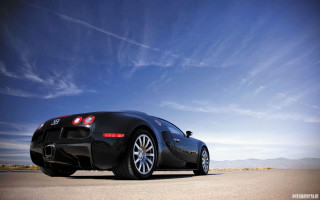 Black sports car road clouds - luxury free wallpaper