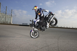 Man motorcycle trick air helmet 2 - a trick in the air free wallpaper