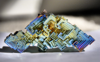 Diamond closeup tabletop blurry background - angular free wallpaper