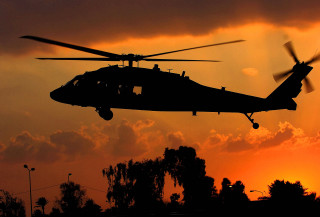 Helicopter sunset clouds flying dawn - a helicopter free wallpaper