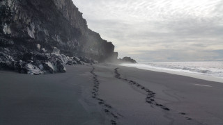 Beach rock cliff footprints sand - art free wallpaper for desktop