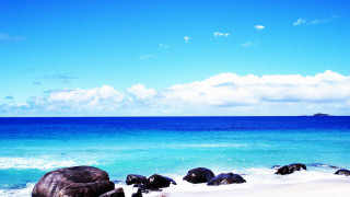 Beach rocks water sky clouds - impressionist free wallpaper