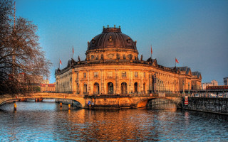 Large building river bridge crossing - top of a river next free wallpaper
