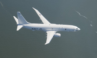 White airplane over ocean small - pathfinder free wallpaper