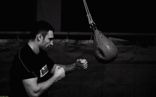 Man holding punching bag gym - constructivism free wallpaper