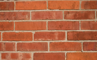 Close up brick wall red - constructivism free wallpaper