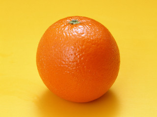Orange yellow surface green spot - a yellow surface free wallpaper