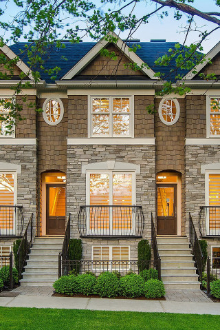 Brick houses with clocks front - enguerrand quarton free wallpaper
