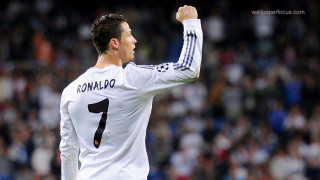 Man white shirt raising fist - his fist free wallpaper