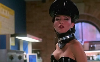 Woman black corset helmet posing - twin peak free wallpaper