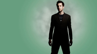 Man black suit green clouds - black shoe free wallpaper